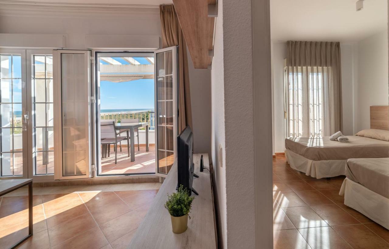 Apartamentos Costaluz Las Dunas Исла-Канела Экстерьер фото